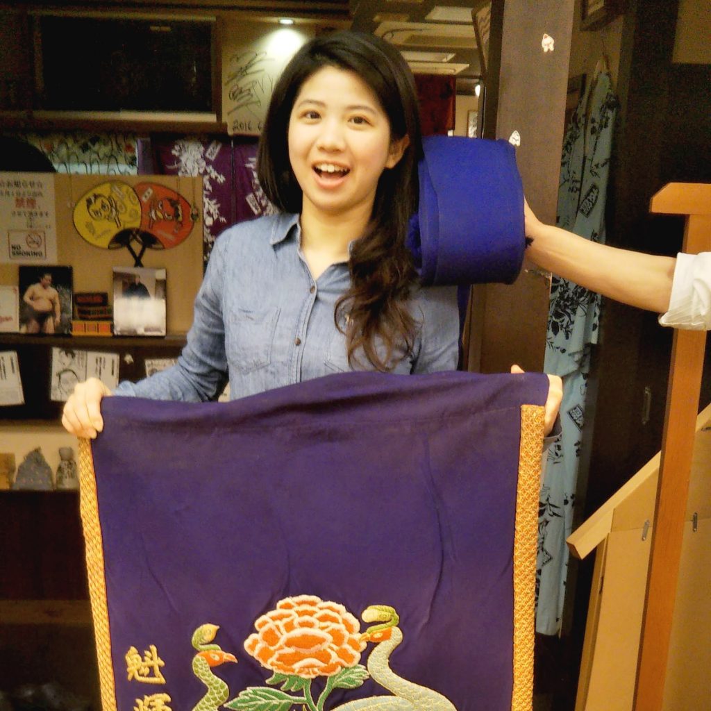 The dazzling decorative apron sumo wrestlers wear is insanely heavy!